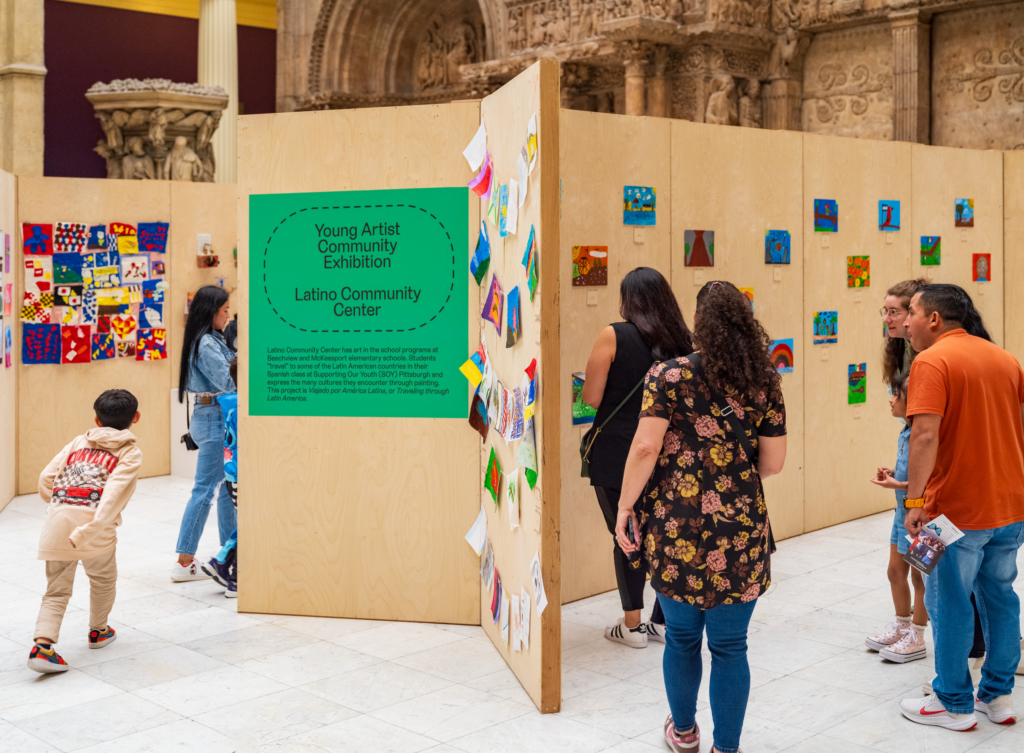 people looking at art