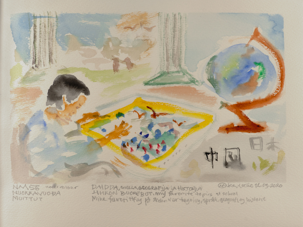 person looking at drawing watercolor