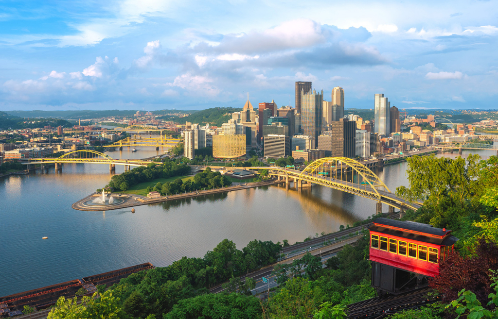 skyline view of the city of pittsburgh with the inline in the foreground