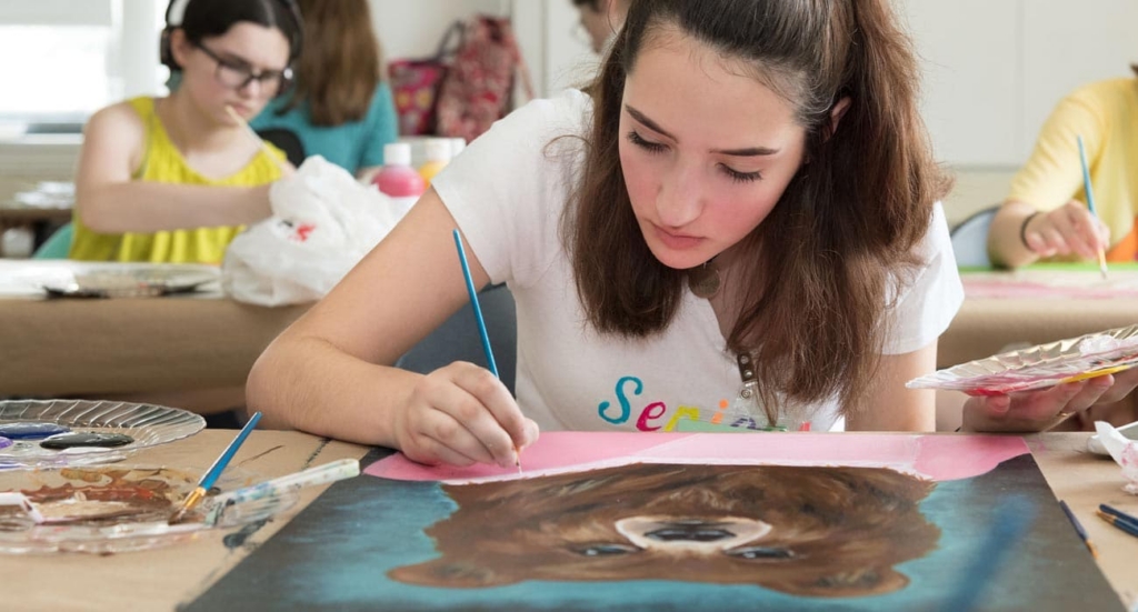 a high school student painting