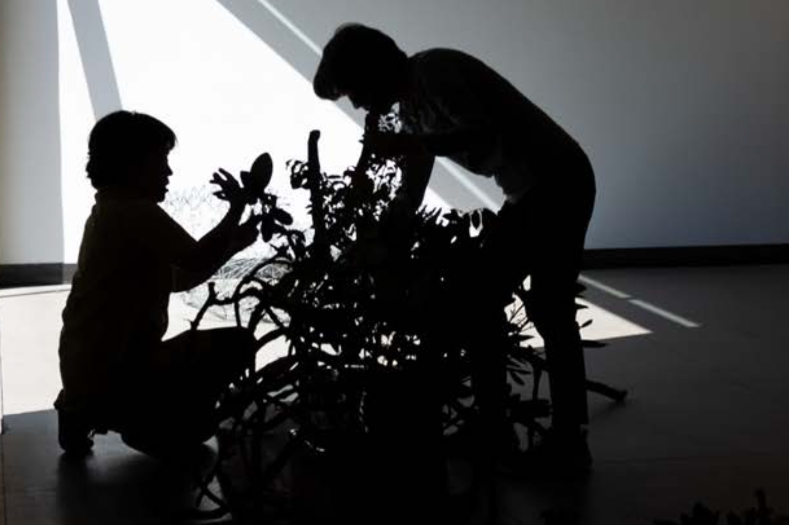 people installing a ikebana installation